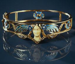 BRAÇALET AMB CAP FEMENI LLUIS MASRIERA 
C P